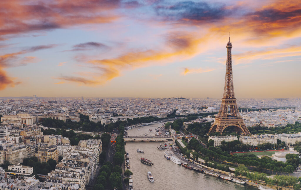 Aerial of Paris city with Seine river during sunset France